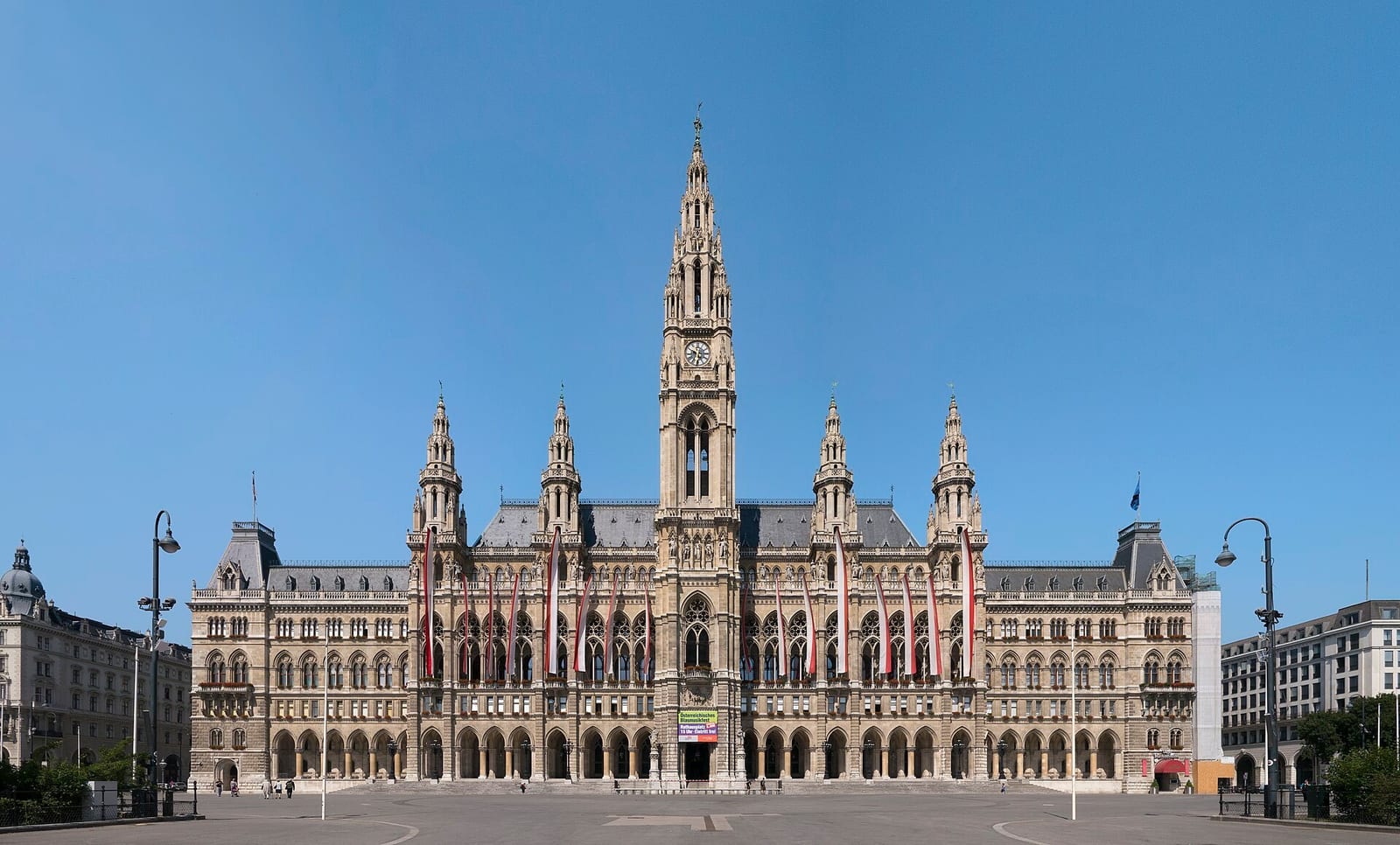 Vienna's neo-Gothic City Hall spire rises over Rathausplatz, home to the Christkindlmarkt